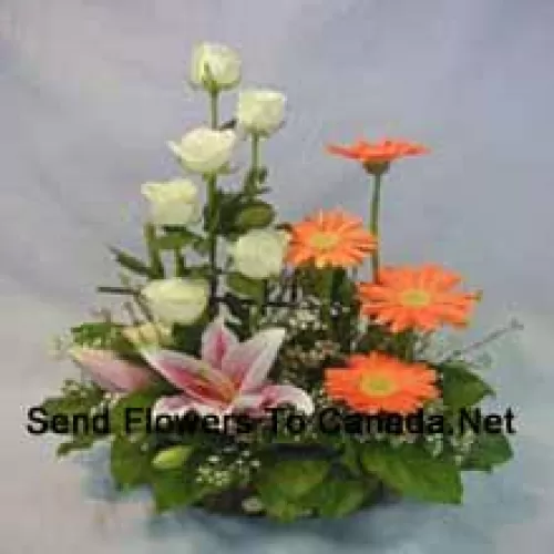 Basket Of Assorted Flowers Including Lilies, Roses And Daisies