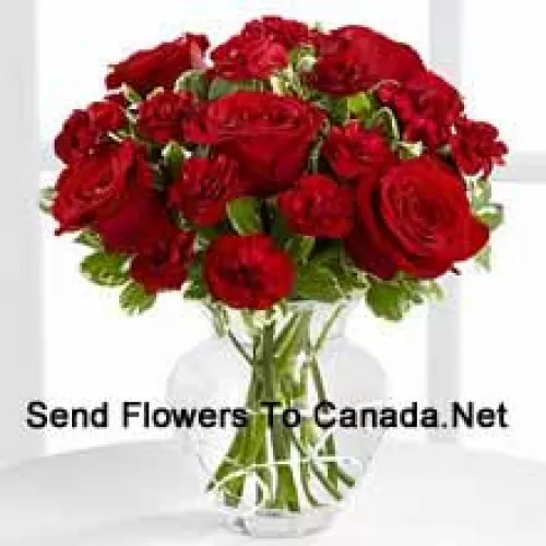 9 Red Roses And 8 Red Carnations In A Glass Vase