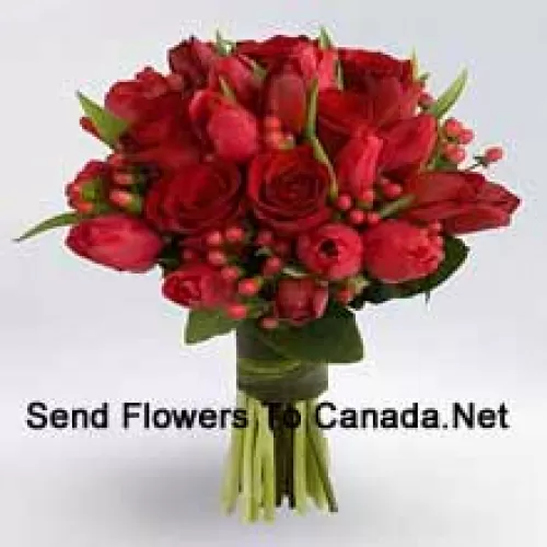 Bunch Of Red Roses And Red Tulips With Red Seasonal Fillers.