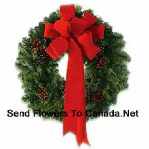 This stylish wreath with an extravagant red silk ribbon is made so your dear ones can celebrate Christmas with style (Please Note That We Reserve The Right To Substitute Any Product With A Suitable Product Of Equal Value In Case Of Non-Availability Of A Certain Product)